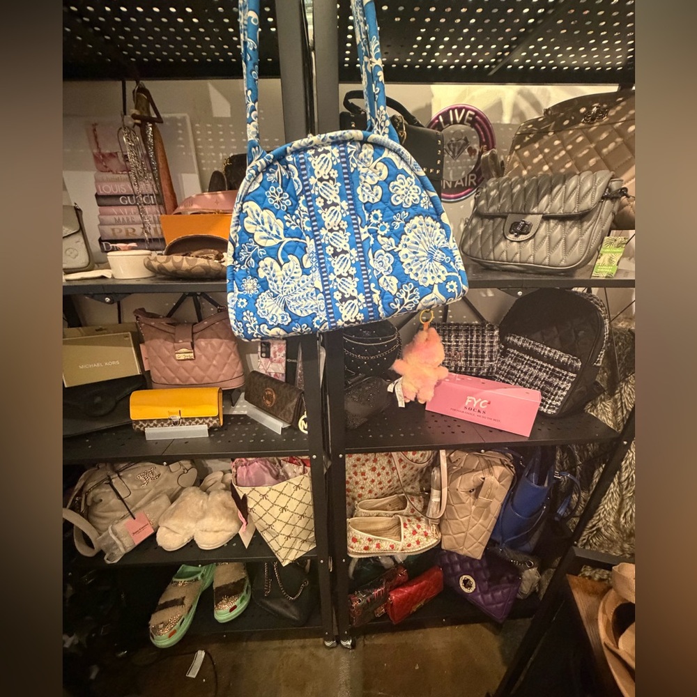 Various styles of Badgley Mischka, Juicy Couture, Michael Kors, Vera Bradley